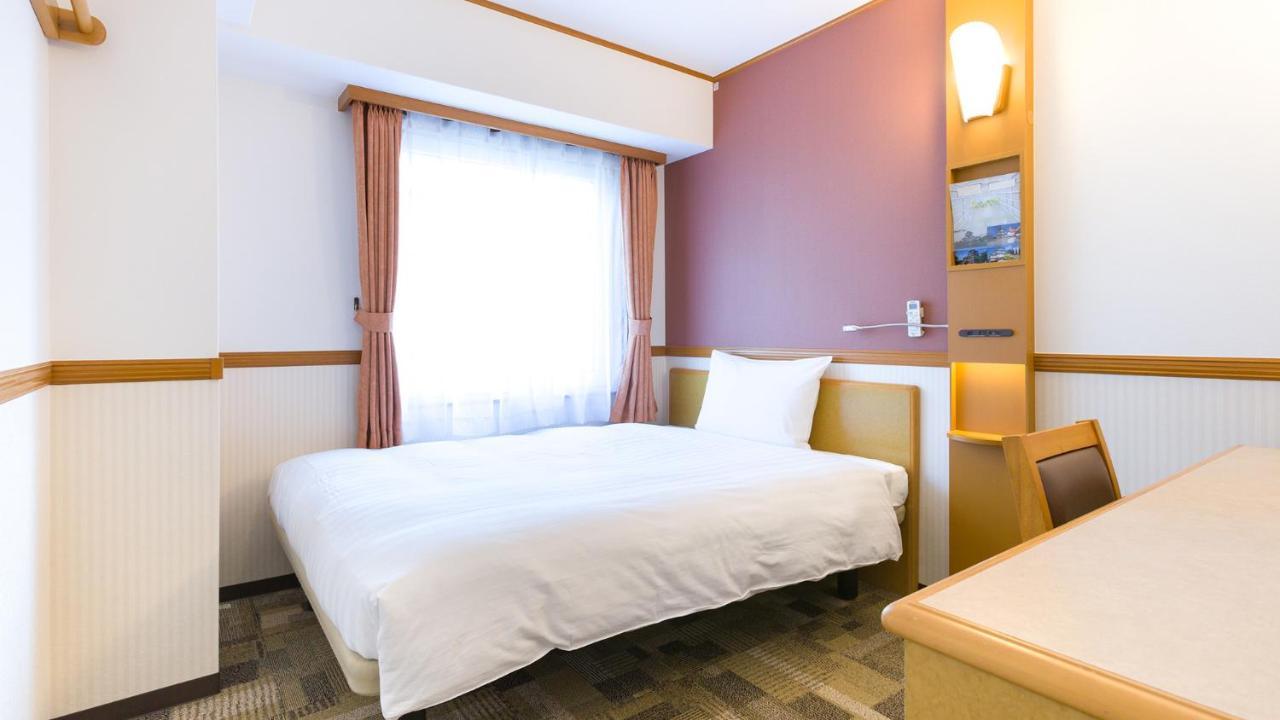 Toyoko Inn Okayama Eki Nishi Guchi Migi Bagian luar foto